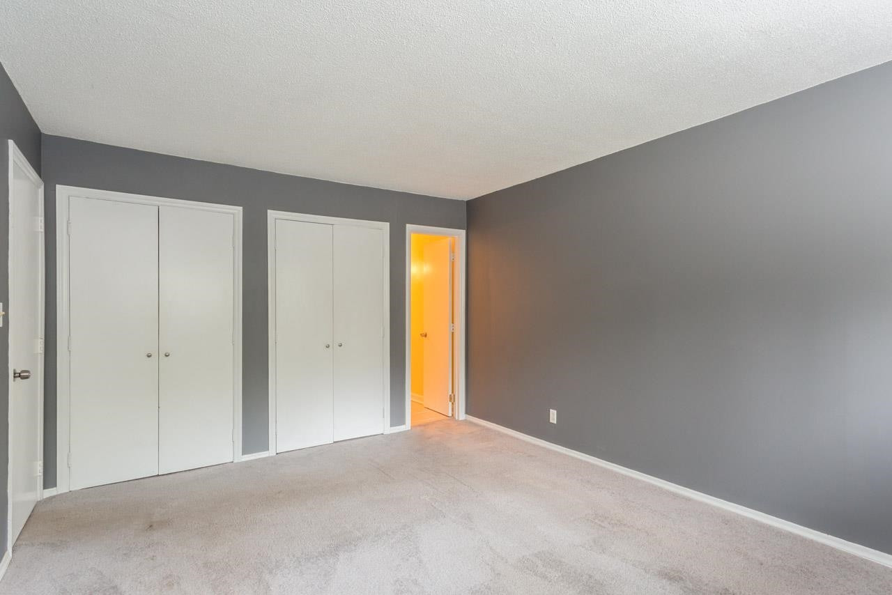 5036 Flint Ridge Place, Unit 5036 Raleigh, NC 27609 - Photo 10 of 18 a view of an empty room and window