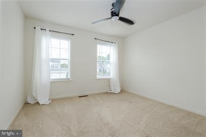 122 Blakely Road Kearneysville, WV 25430 - Photo 14 of 26 an empty room with windows