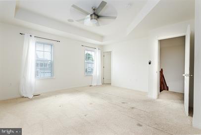 122 Blakely Road Kearneysville, WV 25430 - Photo 18 of 26 an empty room with a ceiling fan and window