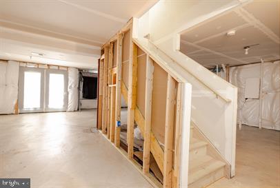 122 Blakely Road Kearneysville, WV 25430 - Photo 23 of 26 a view of a hallway with wooden floor and staircase