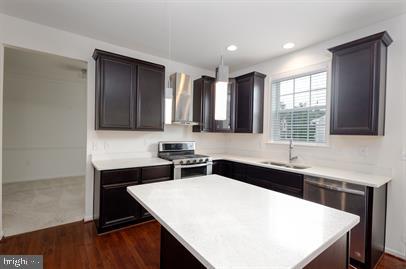 122 Blakely Road Kearneysville, WV 25430 - Photo 6 of 26 a kitchen with a sink a stove and cabinets