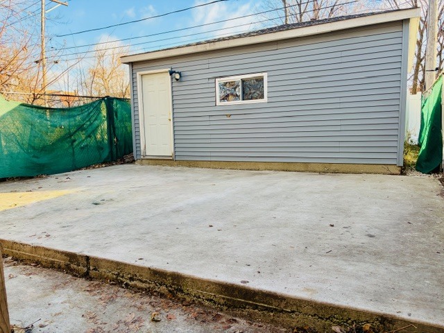6631 South Justine Street Chicago, IL 60636 - Photo 16 of 18 a backyard of a house