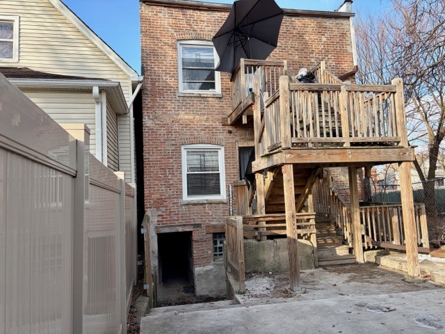 6631 South Justine Street Chicago, IL 60636 - Photo 18 of 18 a front view of a house with stairway