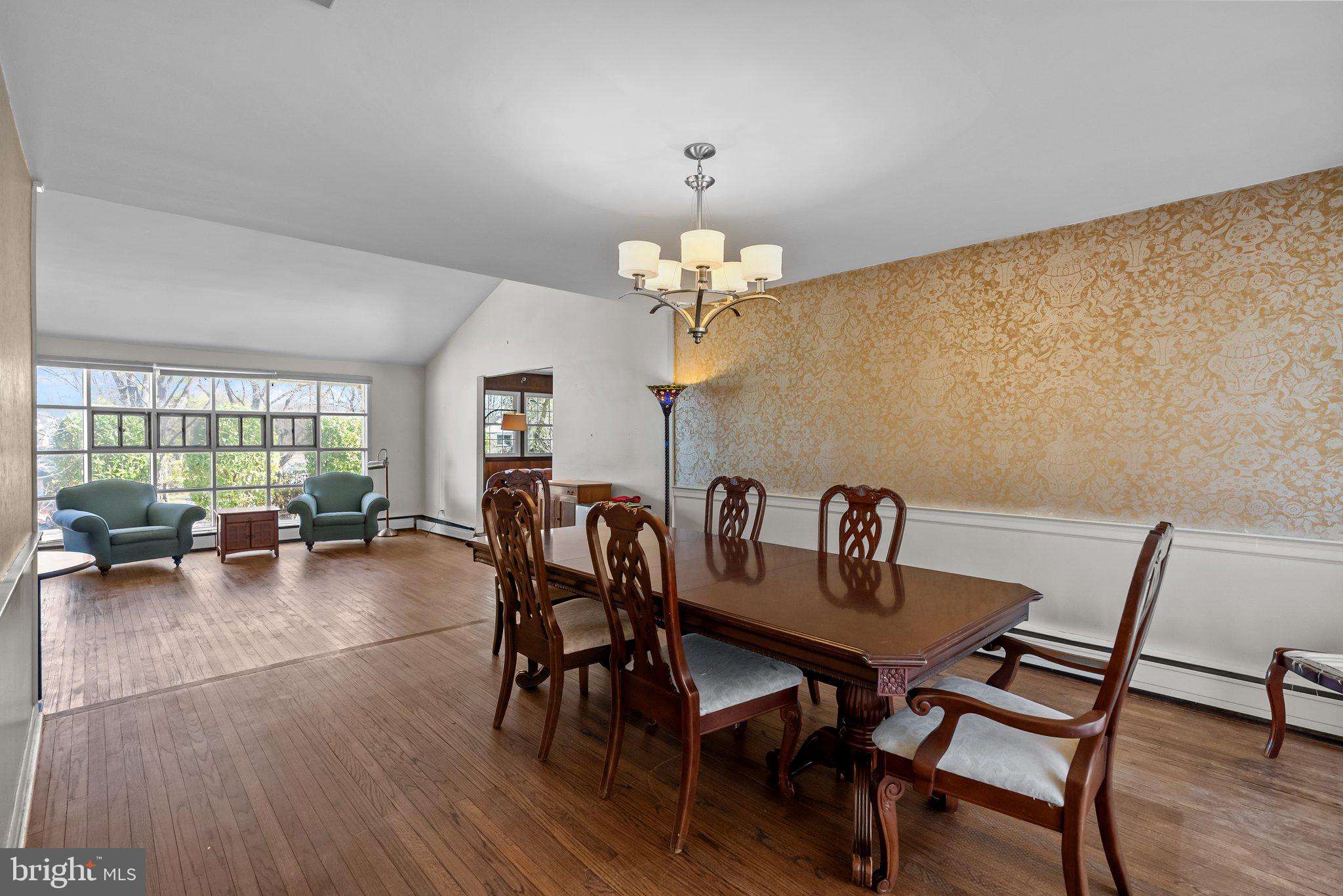 326 Hidden River Road Penn Valley, PA 19072 - Photo 12 of 56 a view of a dining room with furniture and wooden floor