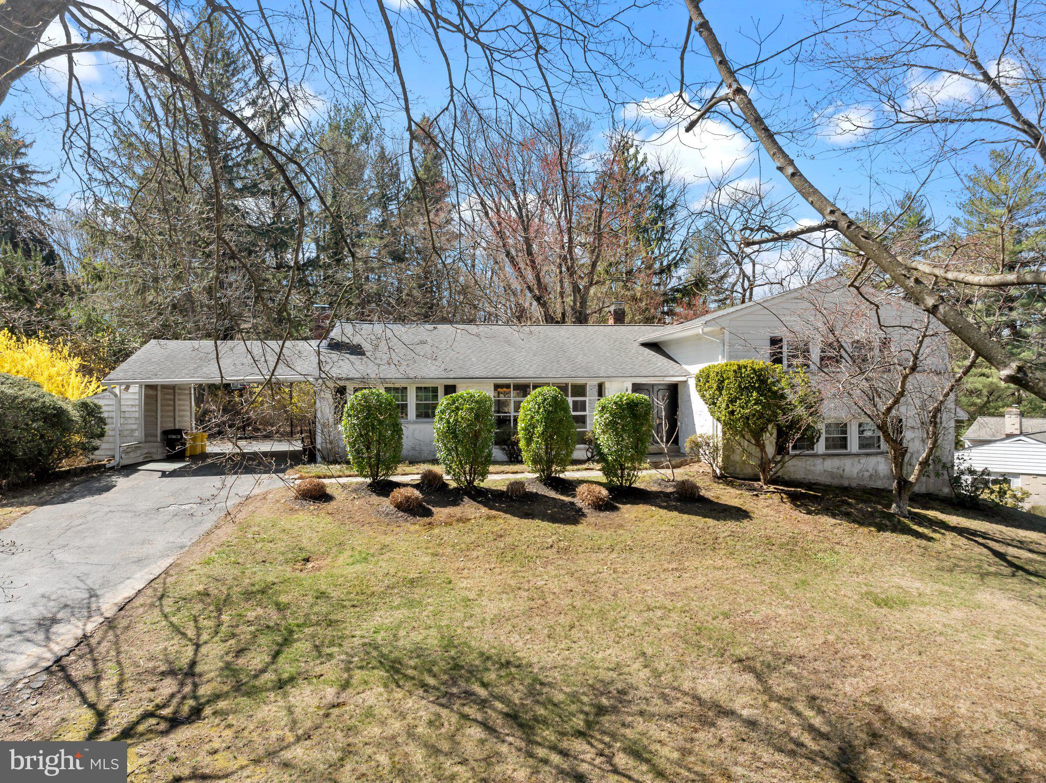 326 Hidden River Road Penn Valley, PA 19072 - Photo 2 of 56 a view of a backyard with sitting area