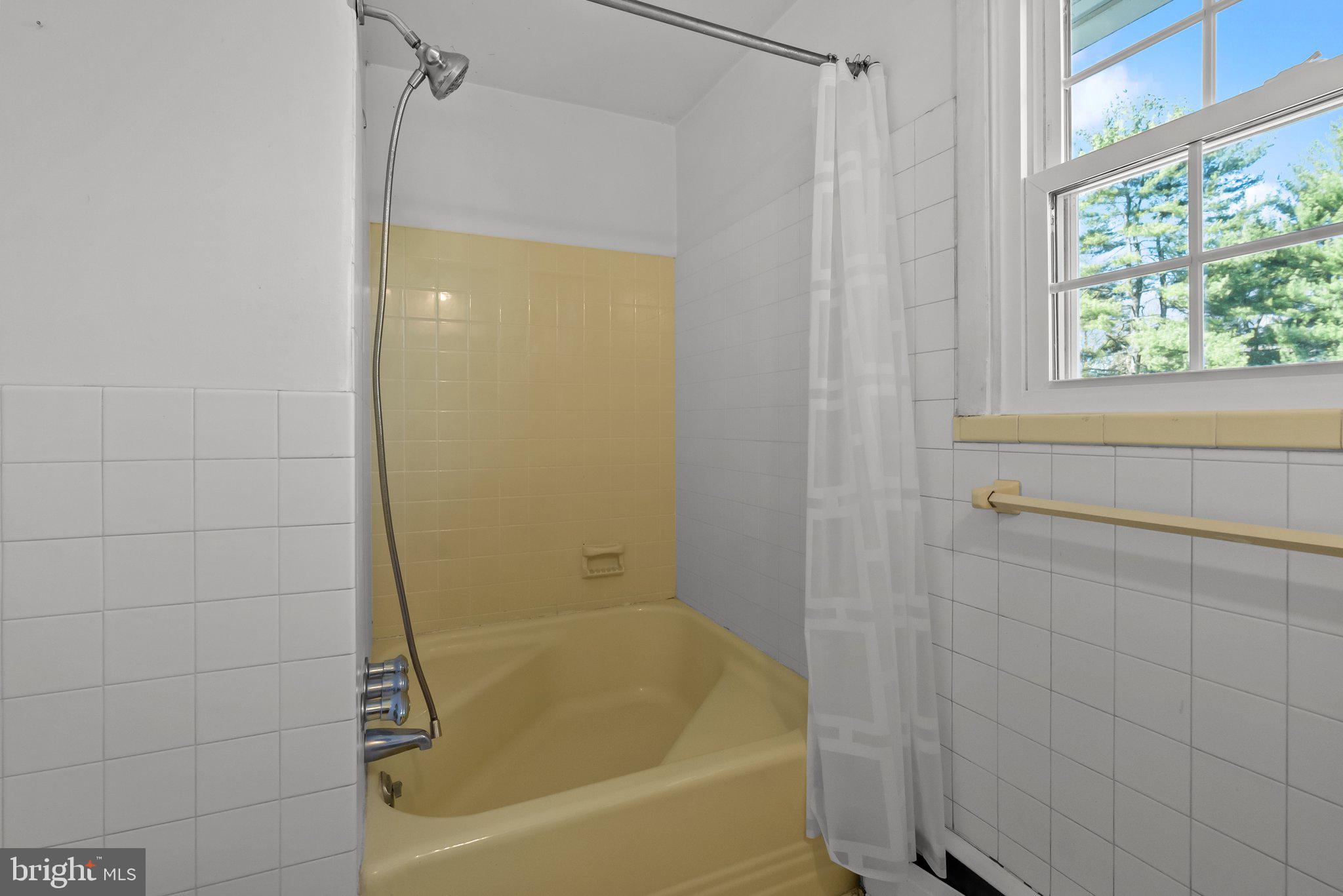 326 Hidden River Road Penn Valley, PA 19072 - Photo 26 of 56 a bathroom with a bathtub