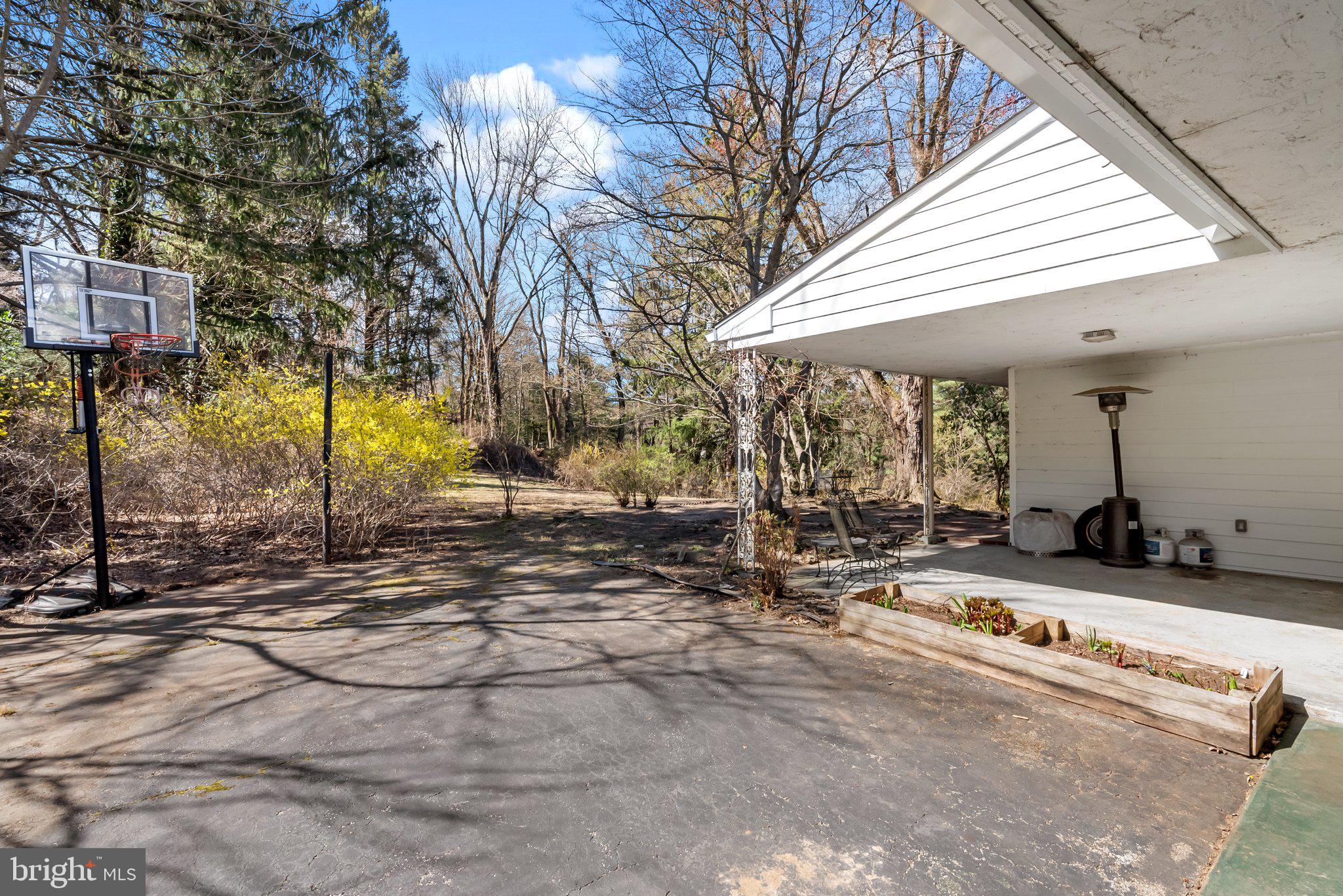 326 Hidden River Road Penn Valley, PA 19072 - Photo 42 of 56 a view of a street with a tree
