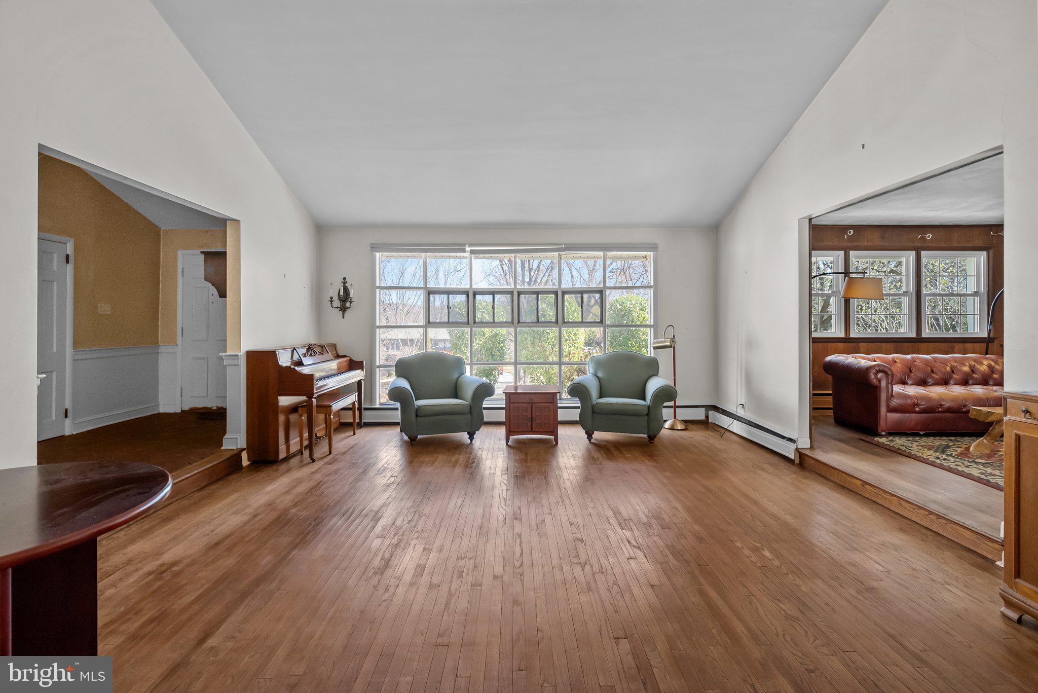 326 Hidden River Road Penn Valley, PA 19072 - Photo 10 of 56 a living room with furniture and a wooden floor