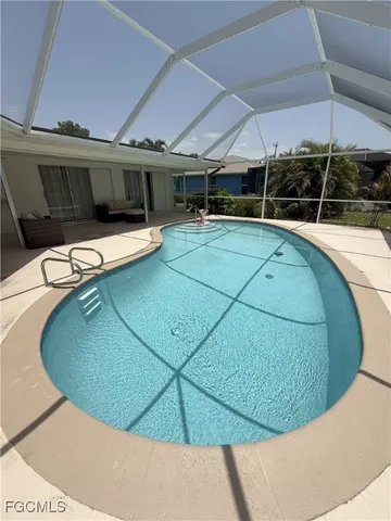 a view of a swimming pool with an outdoor space