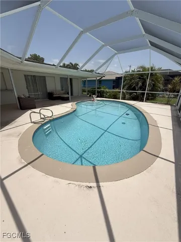 a view of a swimming pool with an outdoor space