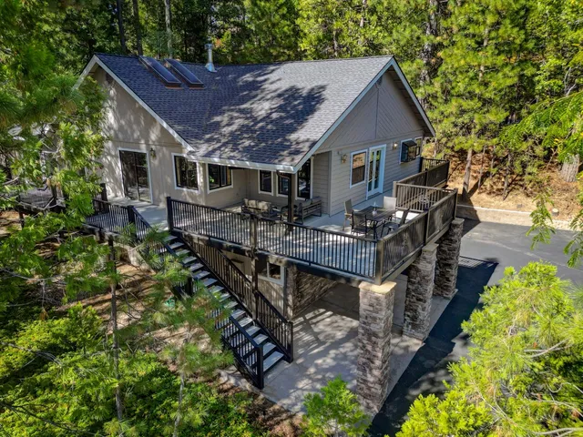 a house with trees in front of it