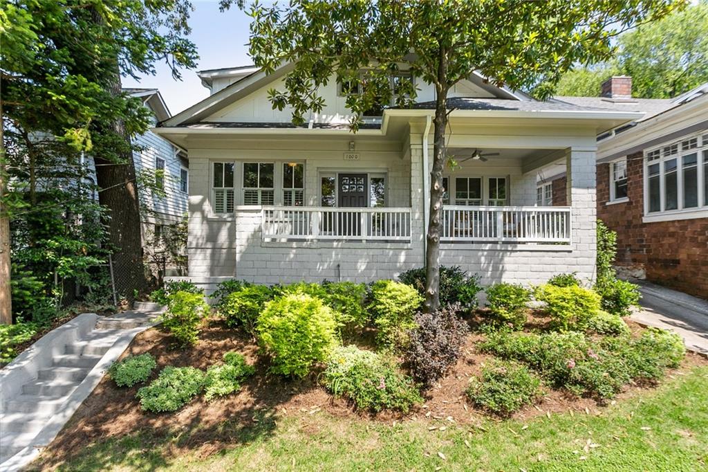 front view of a house with a garden