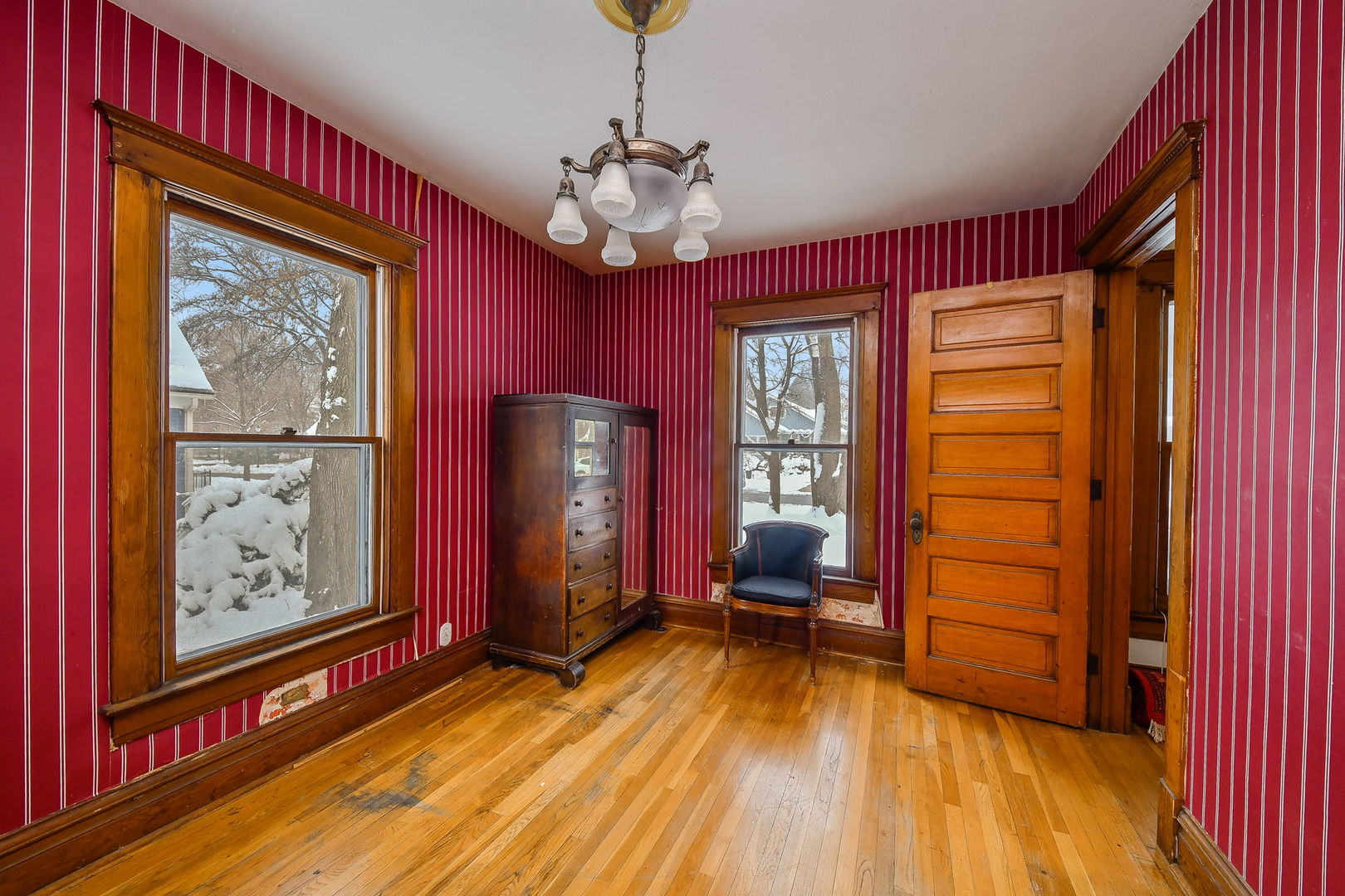 116 South Wright Street Naperville, IL 60540 - Photo 13 of 49 a view of a room with music instruments and windows