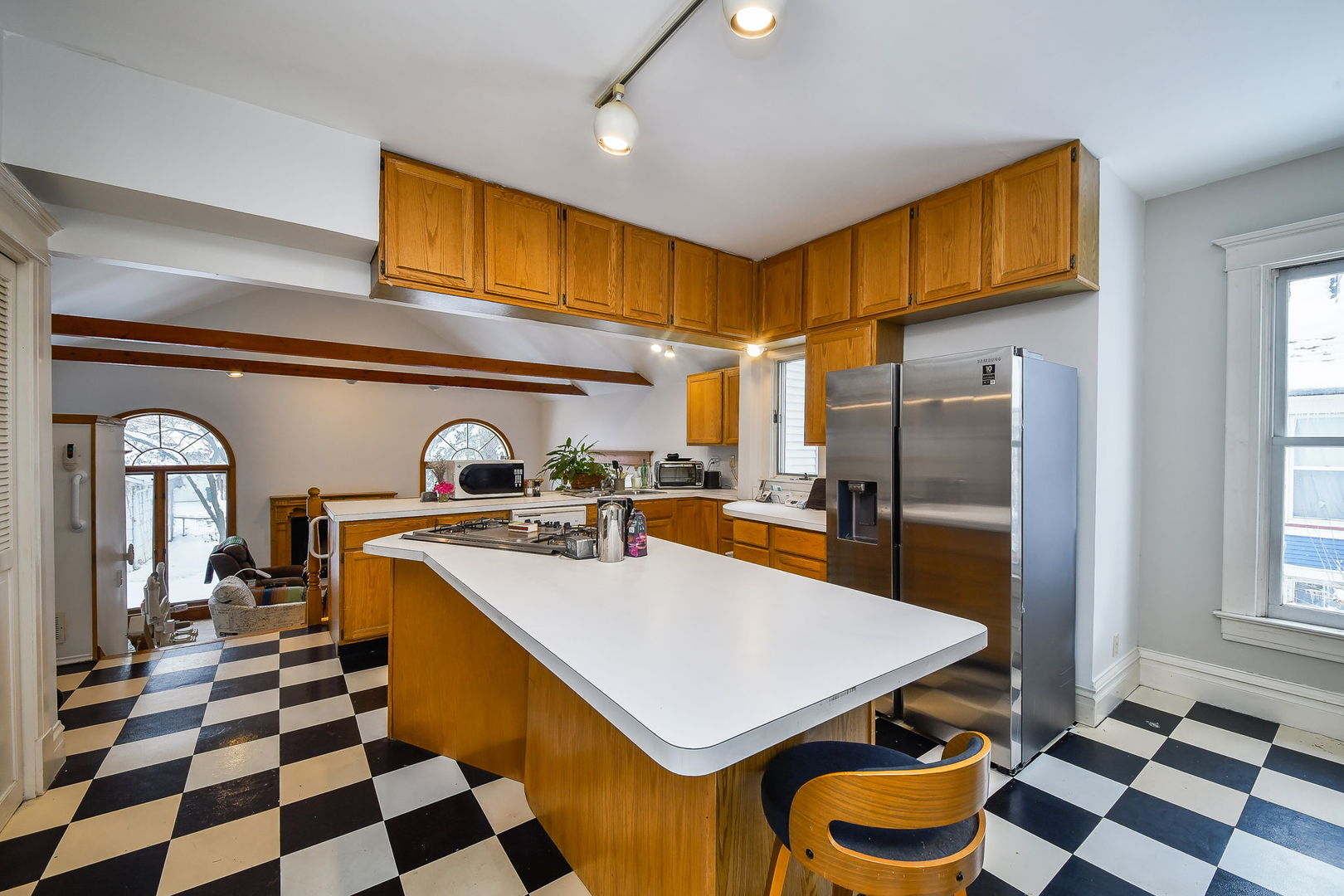 116 South Wright Street Naperville, IL 60540 - Photo 15 of 49 a kitchen with a sink a stove and a refrigerator