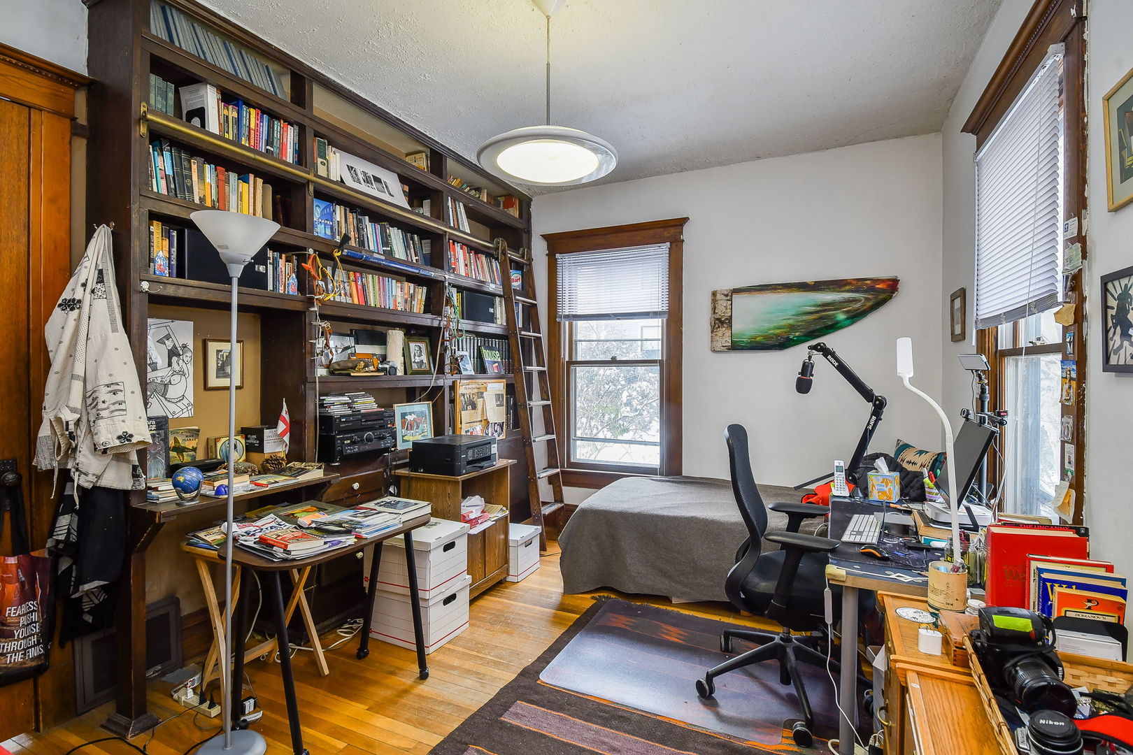 116 South Wright Street Naperville, IL 60540 - Photo 20 of 49 a living room with furniture a bookshelf and a window