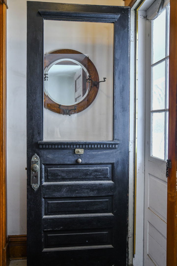 116 South Wright Street Naperville, IL 60540 - Photo 5 of 49 a bathroom with a sink and a mirror