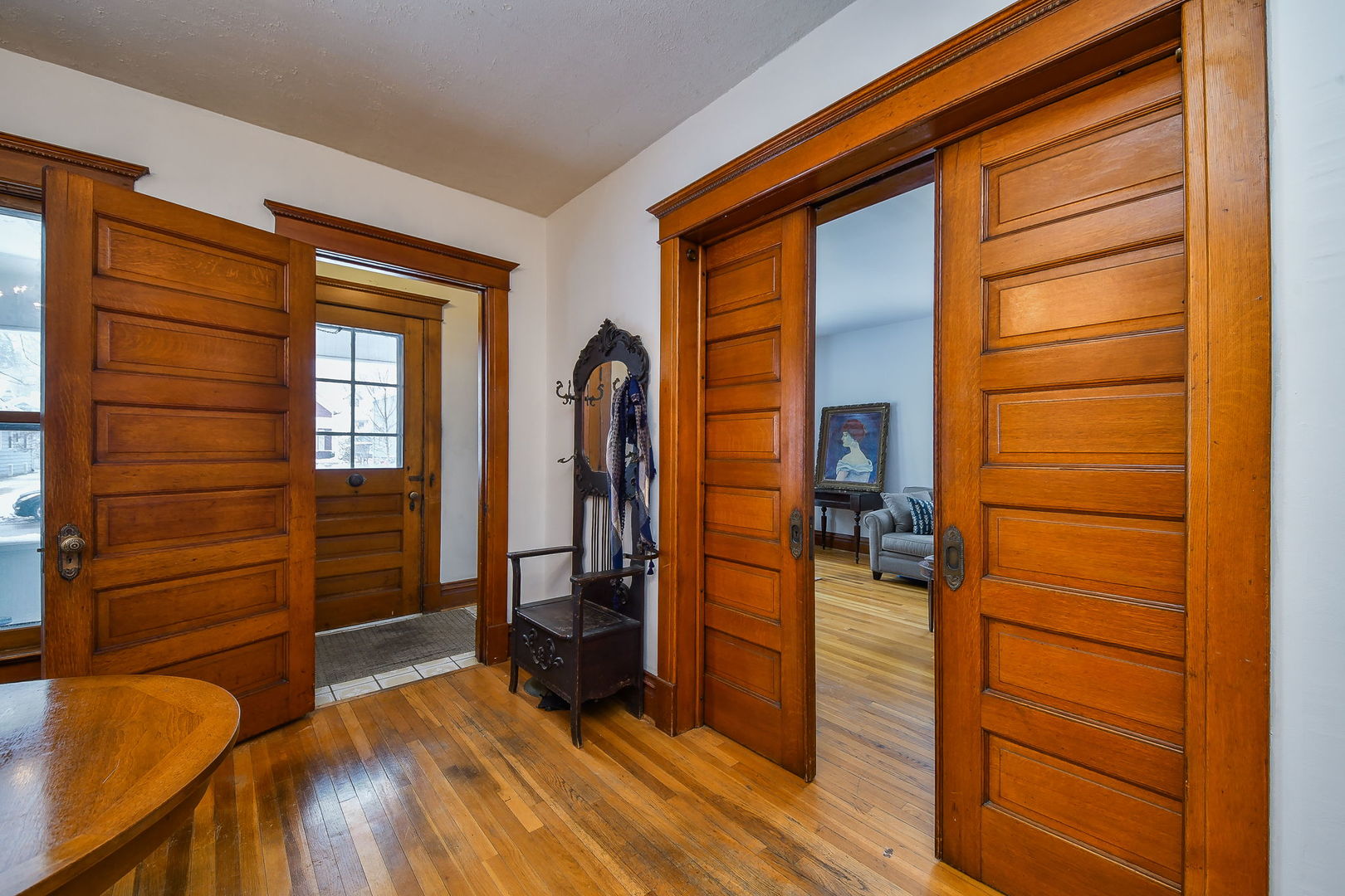 116 South Wright Street Naperville, IL 60540 - Photo 6 of 49 a view of a hallway with closet and wooden floor
