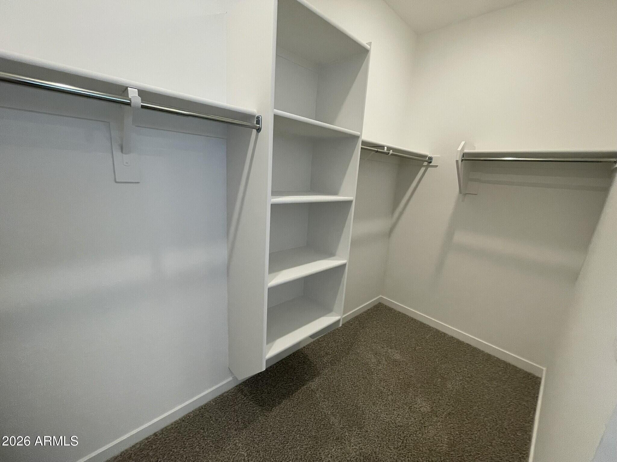 37014 West Prado Street Maricopa, AZ 85138 - Photo 15 of 18 a view of an empty walk in closet