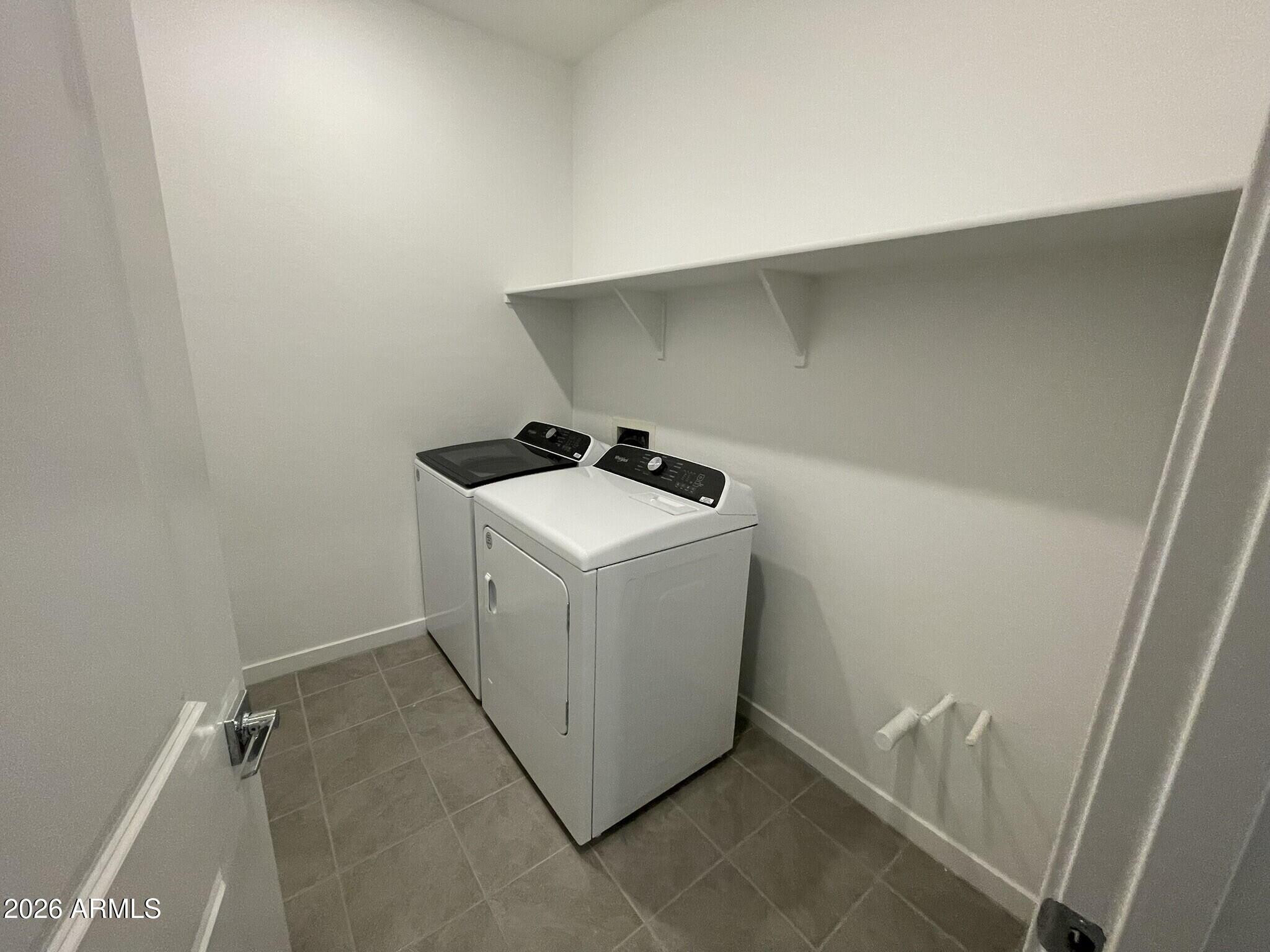 37014 West Prado Street Maricopa, AZ 85138 - Photo 3 of 18 a utility room with dryer and washer