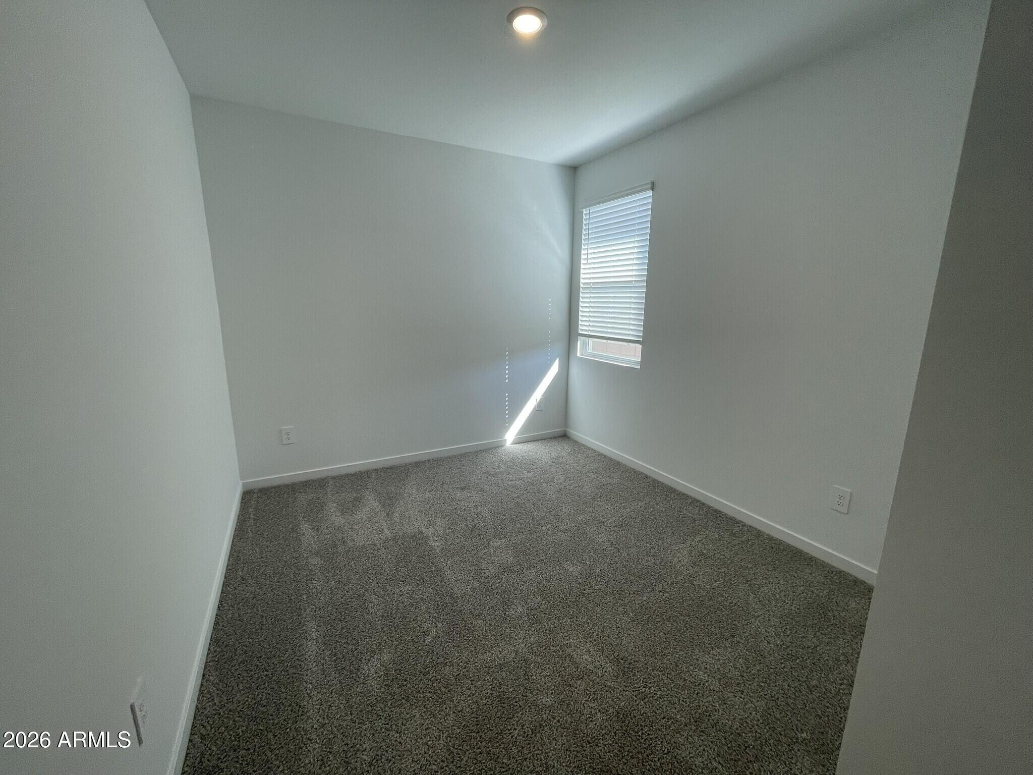 37014 West Prado Street Maricopa, AZ 85138 - Photo 7 of 18 a view of room and hallway