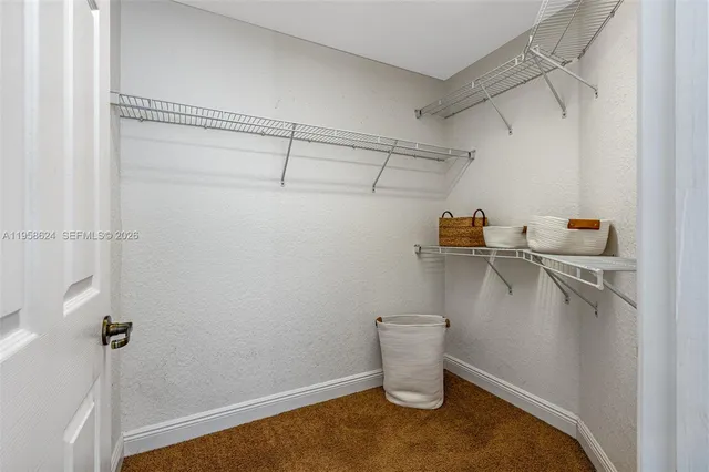 a view of a room with racks on the wall