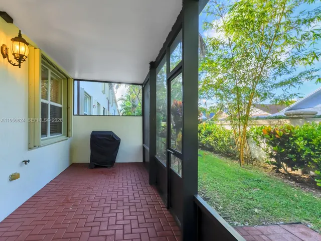 a view of an outdoor space in front of a house