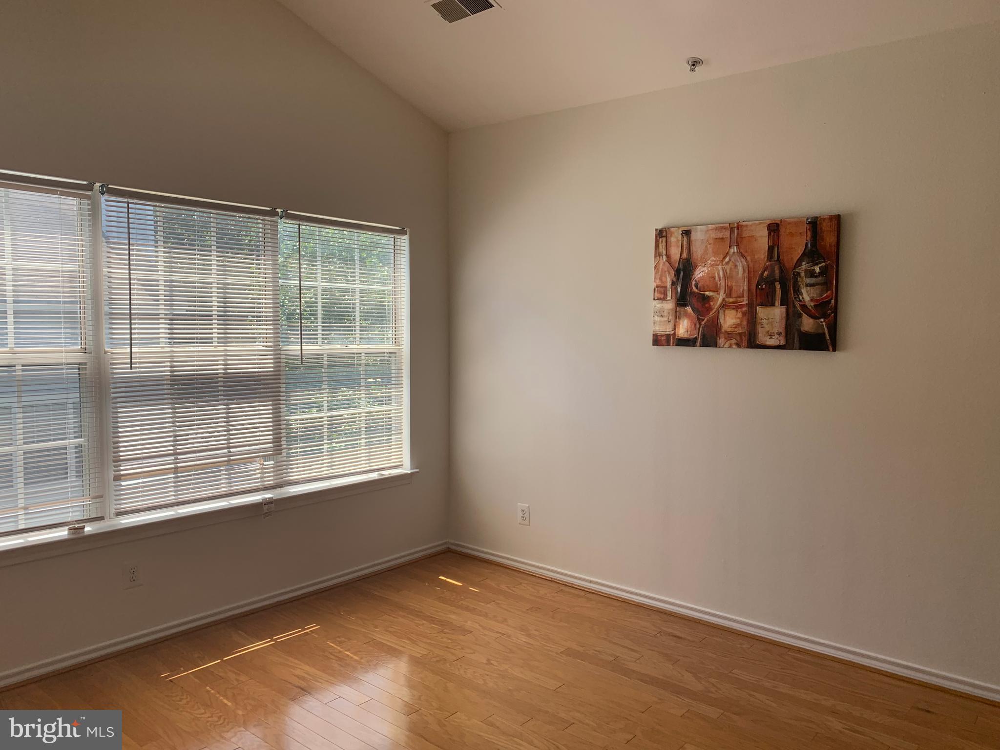 18533 Boysenberry Drive, Unit 288212 Gaithersburg, MD 20879 - Photo 17 of 17 an empty room with a window
