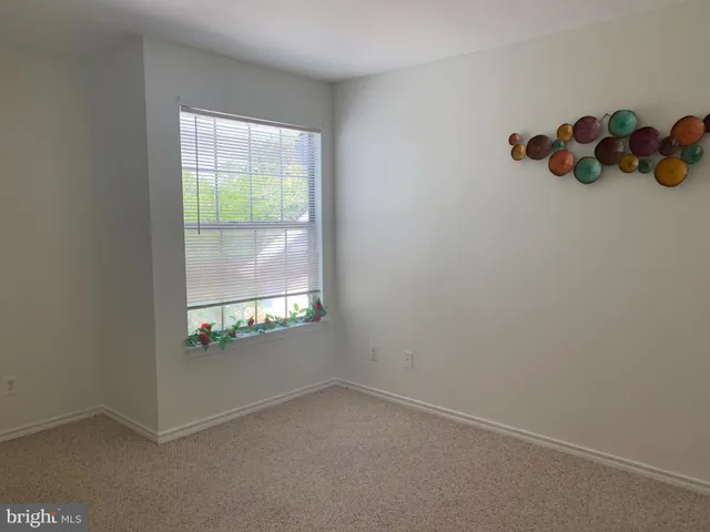 an empty room with window