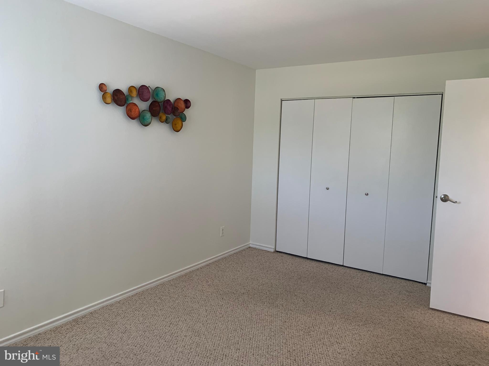 18533 Boysenberry Drive, Unit 288212 Gaithersburg, MD 20879 - Photo 8 of 17 a view of an empty room