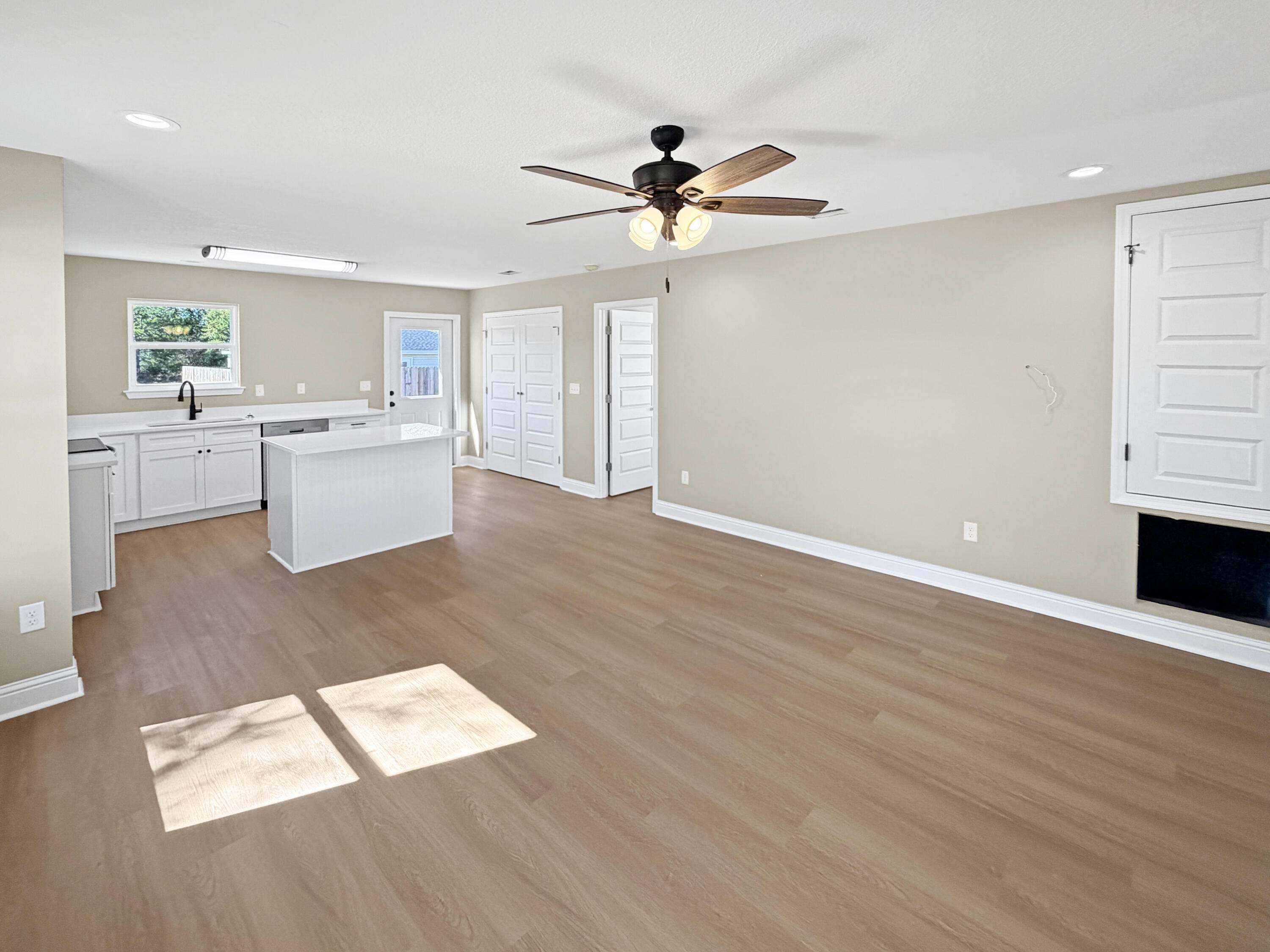 5356 Highview Drive Crestview, FL 32539 - Photo 5 of 18 a view of kitchen with cabinets and wooden floor