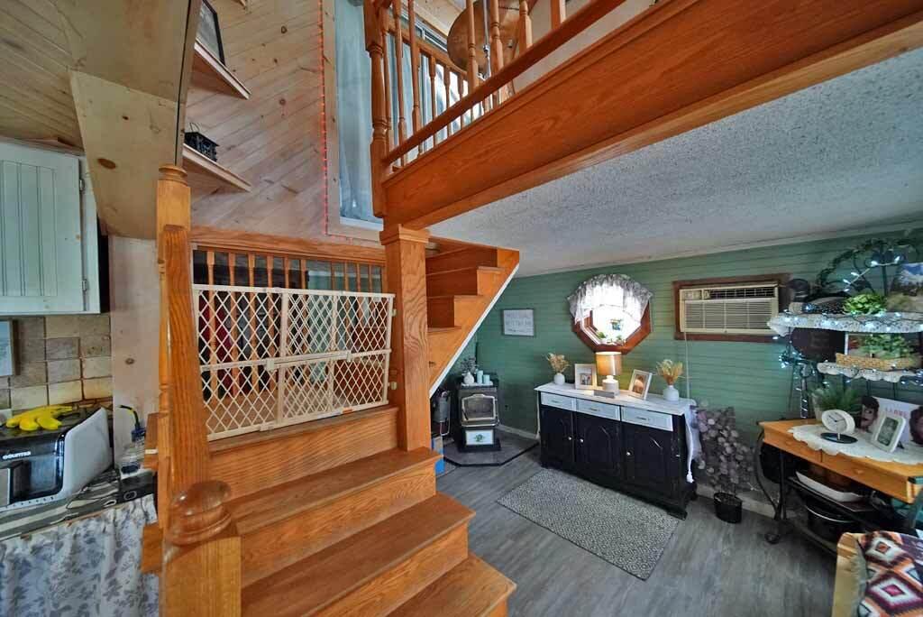 92 Spaulding Lake Road Oakfield, ME 04763 - Photo 18 of 86 2nd-stairway-balcony