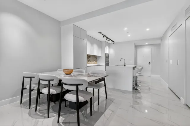 a view of a dining room with furniture