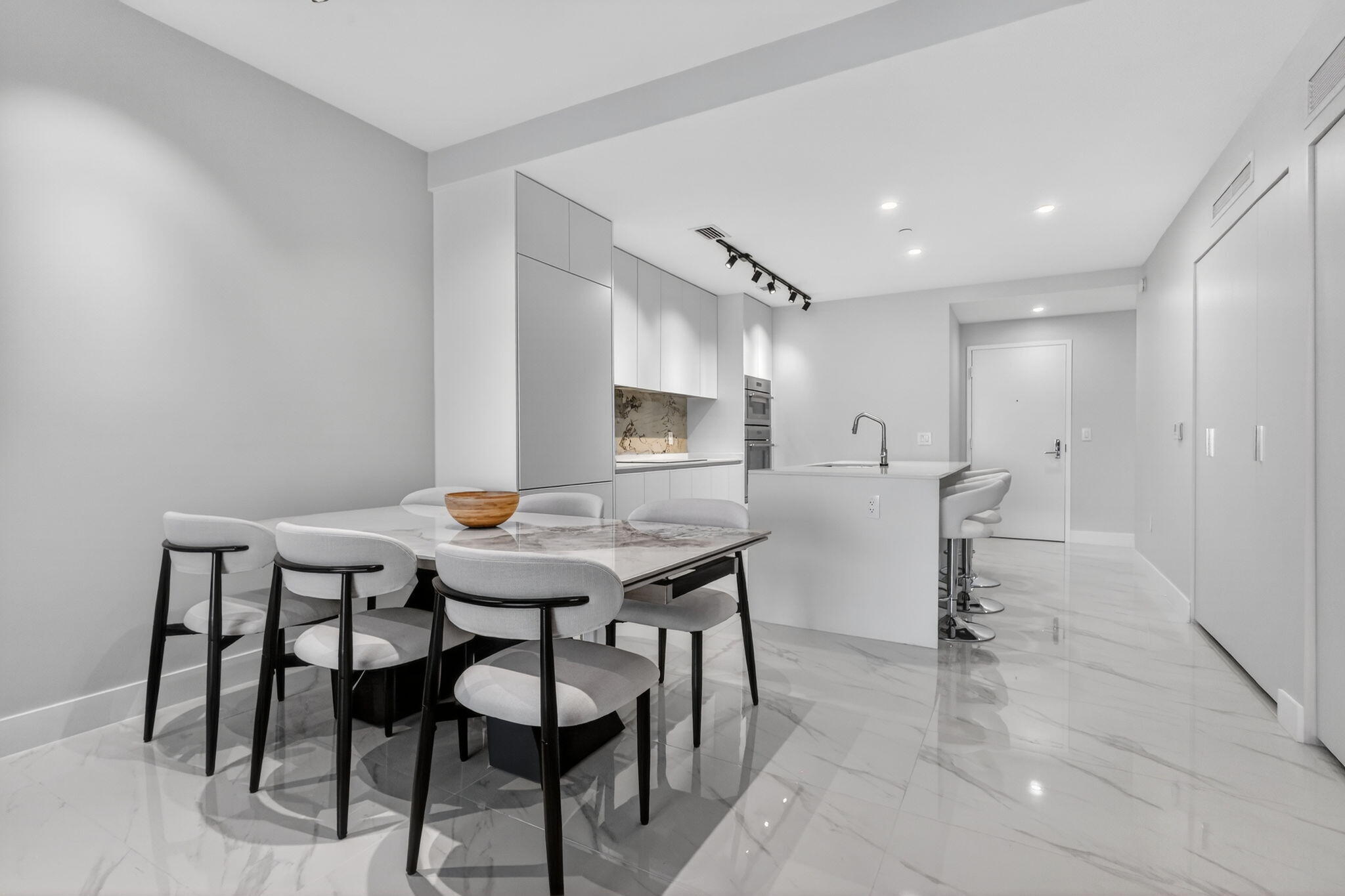 700 Northeast 23rd Street, Unit 2006 Miami, FL 33137 - Photo 2 of 34 a view of a dining room with furniture