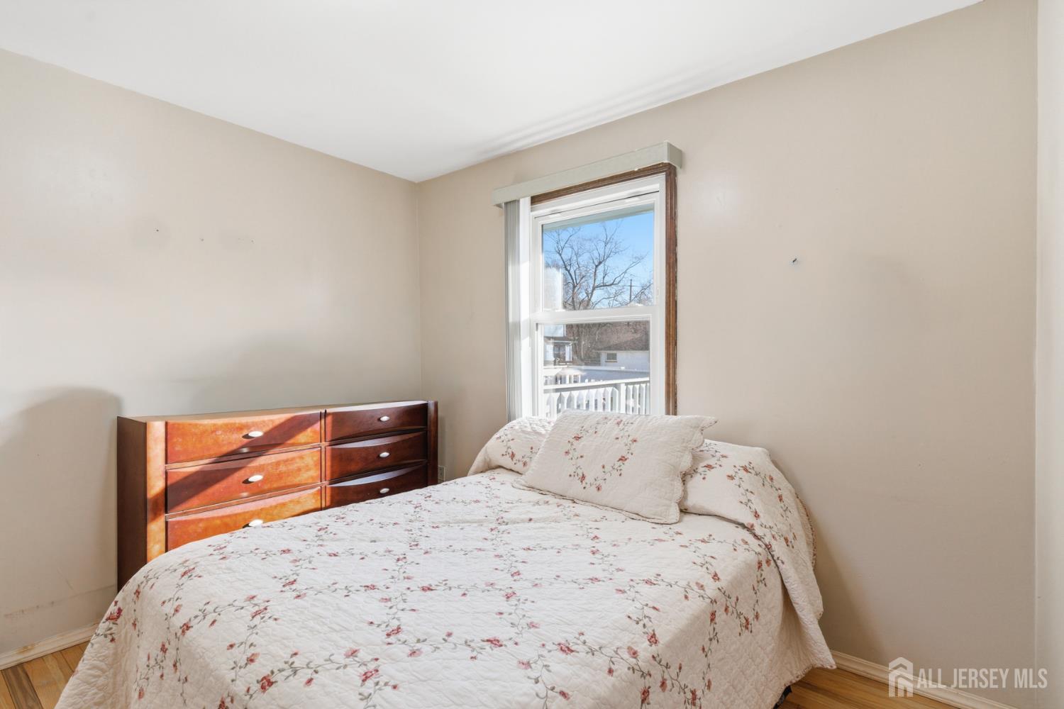 160 Stratton Street South Piscataway, NJ 08854 - Photo 21 of 31 a bedroom with a bed and a window