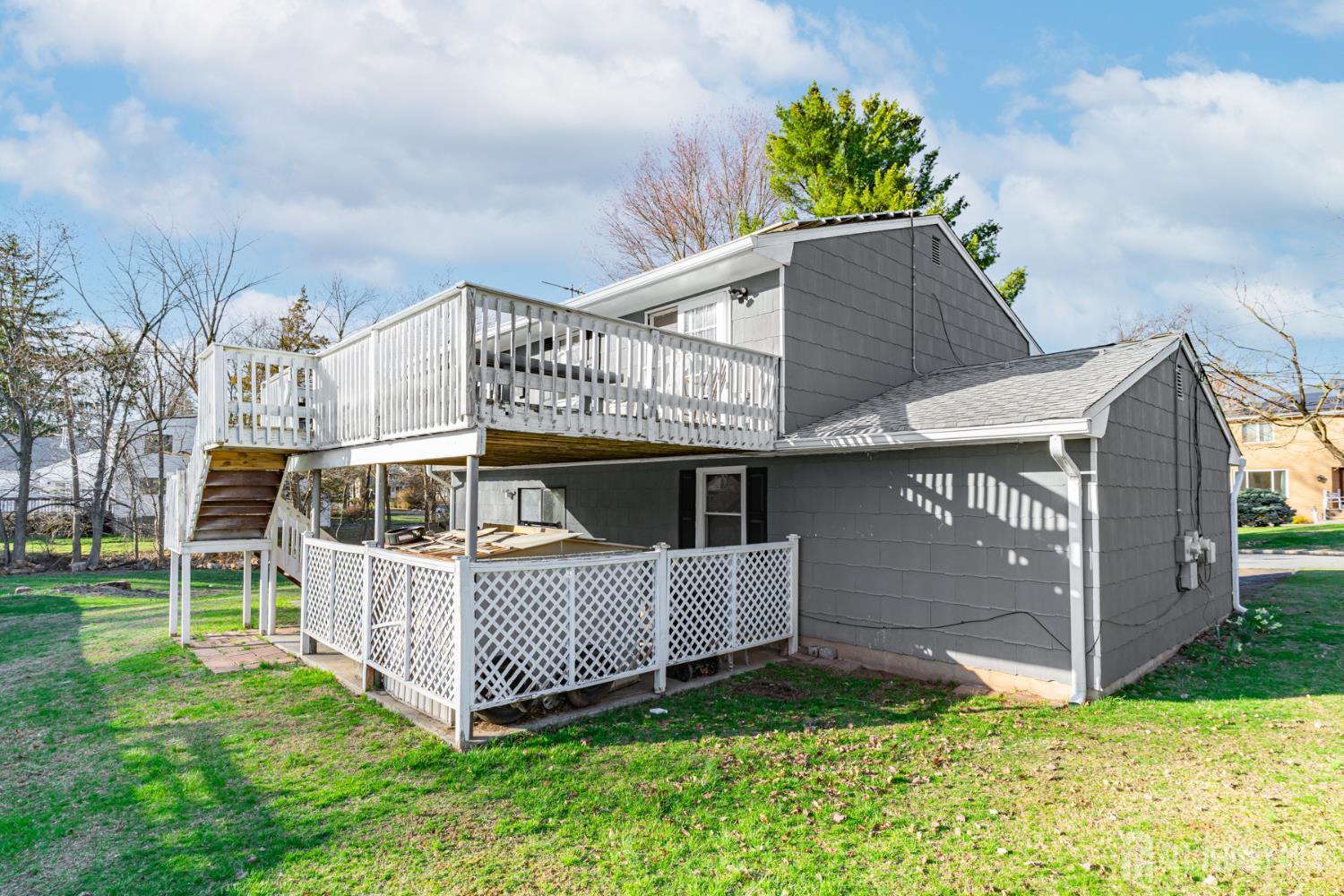 160 Stratton Street South Piscataway, NJ 08854 - Photo 10 of 31 a view of a house with a yard and deck