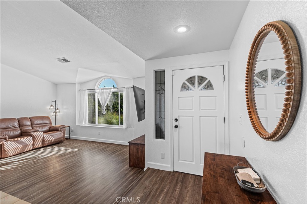 3585 Cabrillo Court Merced, CA 95348 - Photo 1 of 42 a view of livingroom with furniture and wooden floor