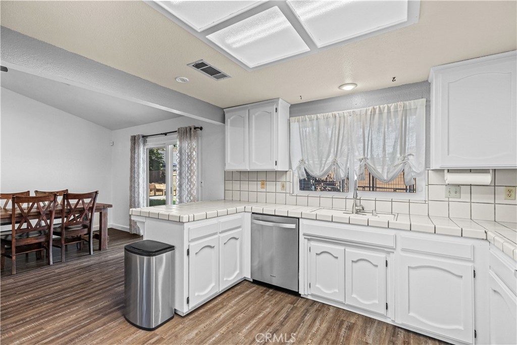 3585 Cabrillo Court Merced, CA 95348 - Photo 12 of 42 a kitchen with a sink and cabinets