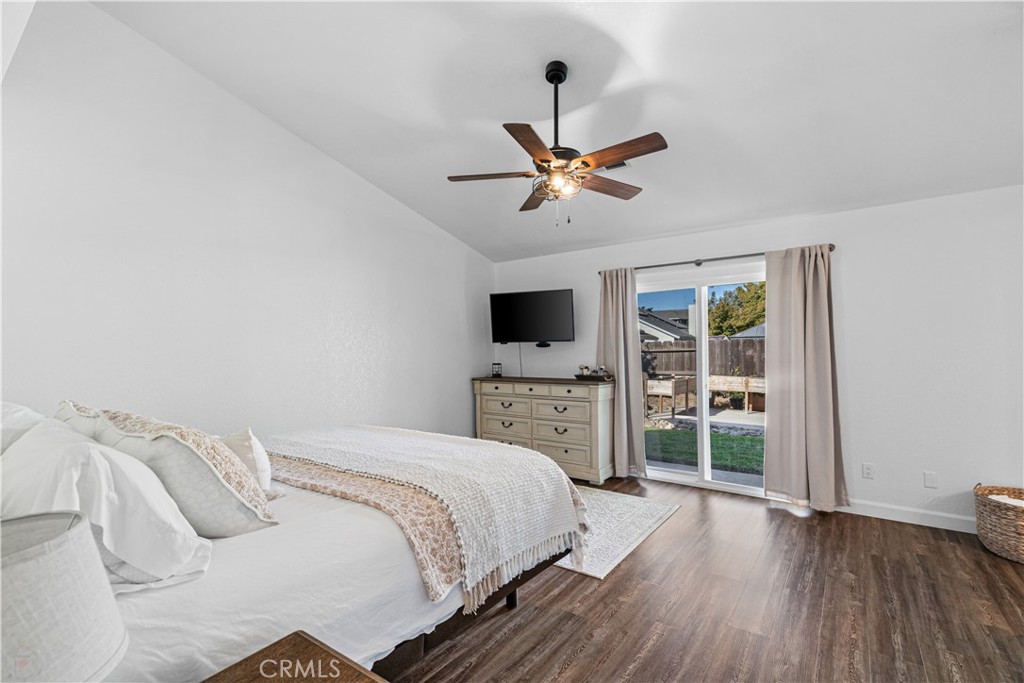 3585 Cabrillo Court Merced, CA 95348 - Photo 27 of 42 a bedroom with a bed and a flat screen tv