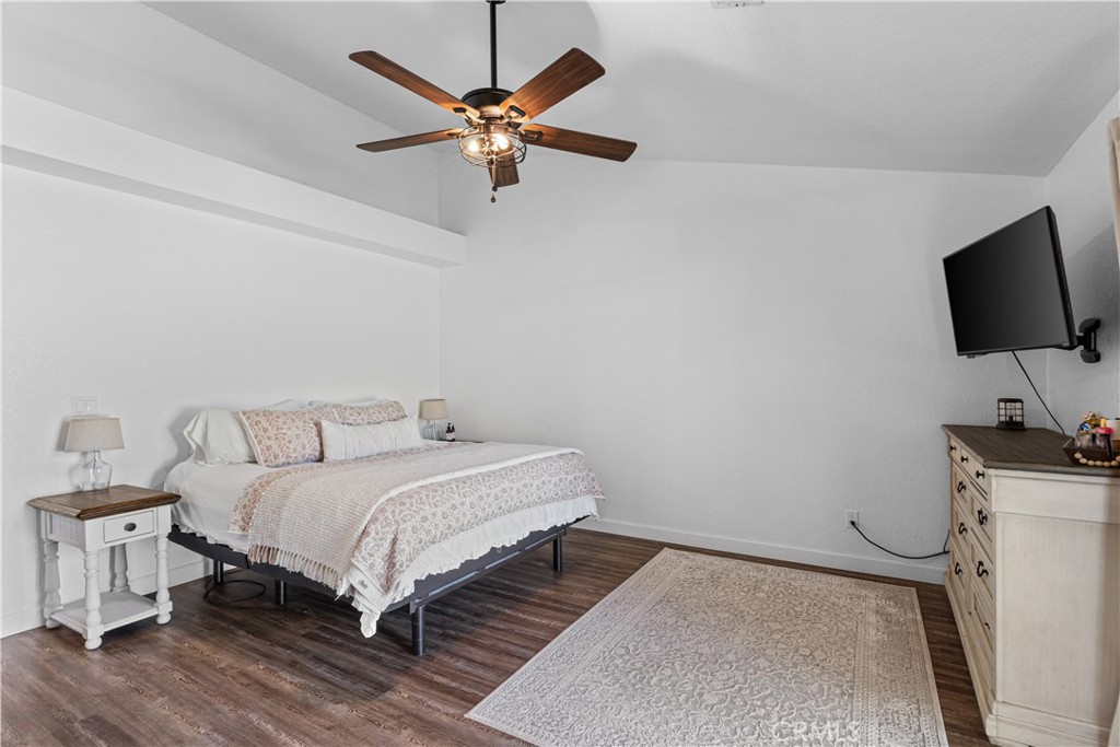 3585 Cabrillo Court Merced, CA 95348 - Photo 28 of 42 a bedroom with a bed and a flat screen tv