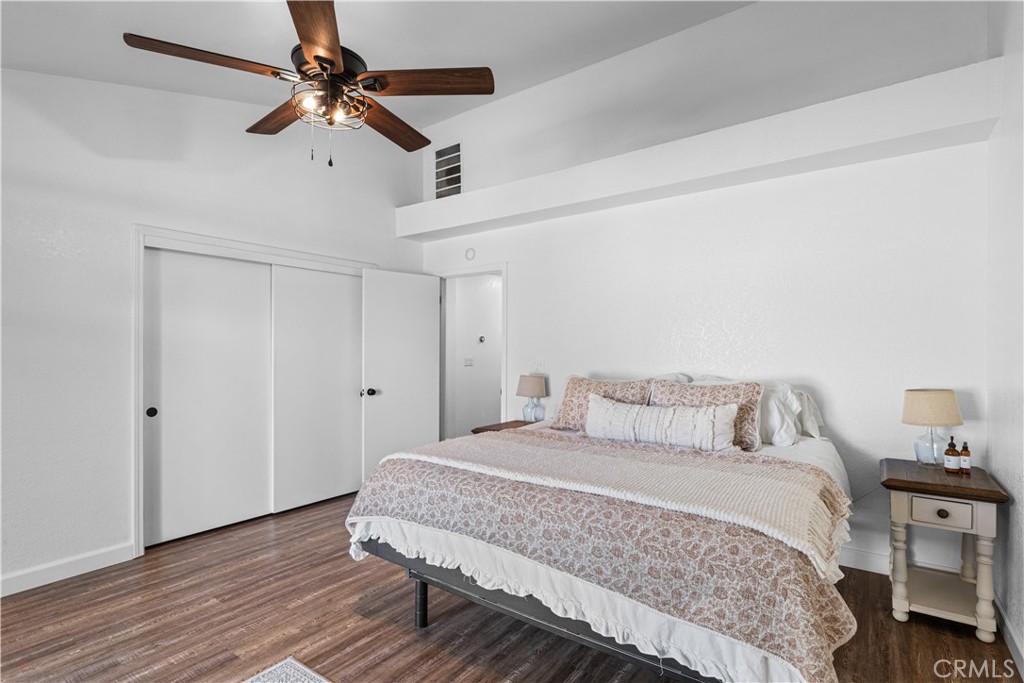 3585 Cabrillo Court Merced, CA 95348 - Photo 29 of 42 a bedroom with a bed and a chandelier