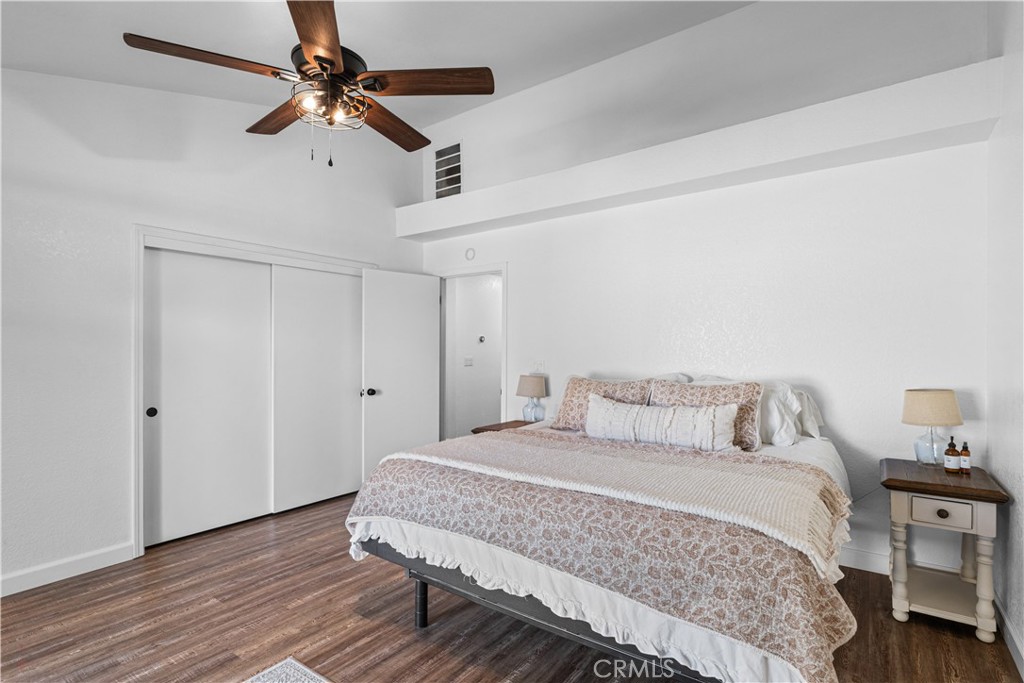 3585 Cabrillo Court Merced, CA 95348 - Photo 32 of 42 a bedroom with a bed and wooden floor