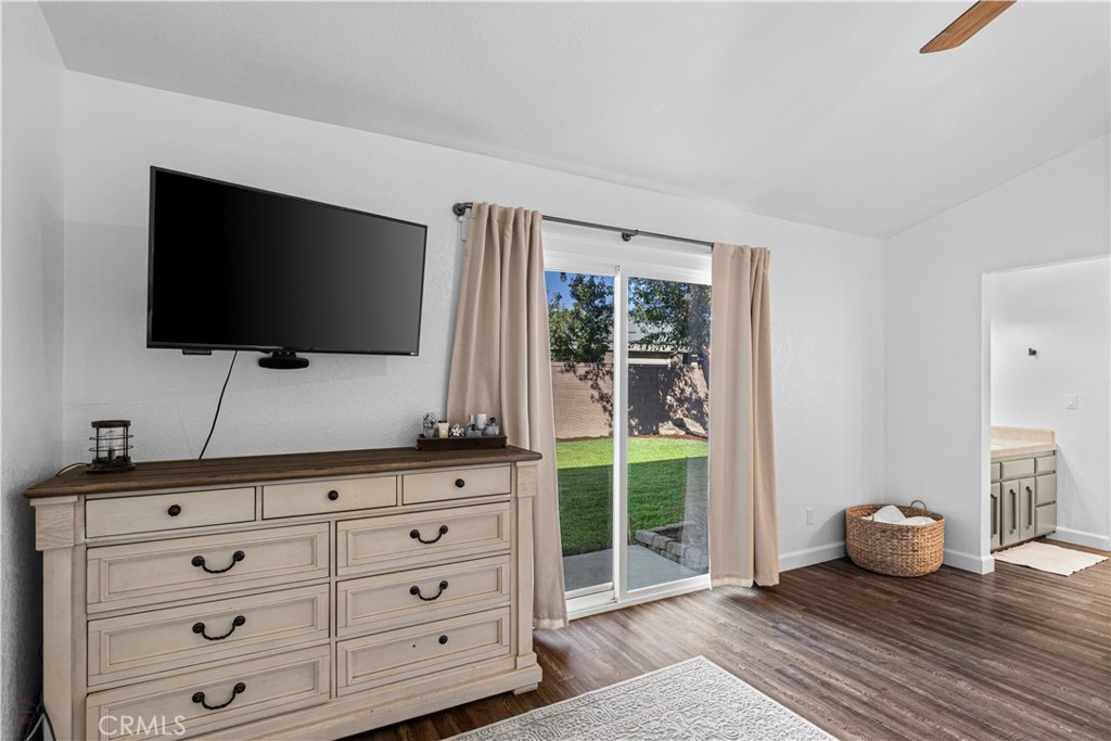 3585 Cabrillo Court Merced, CA 95348 - Photo 33 of 42 a living room with furniture and a flat screen tv