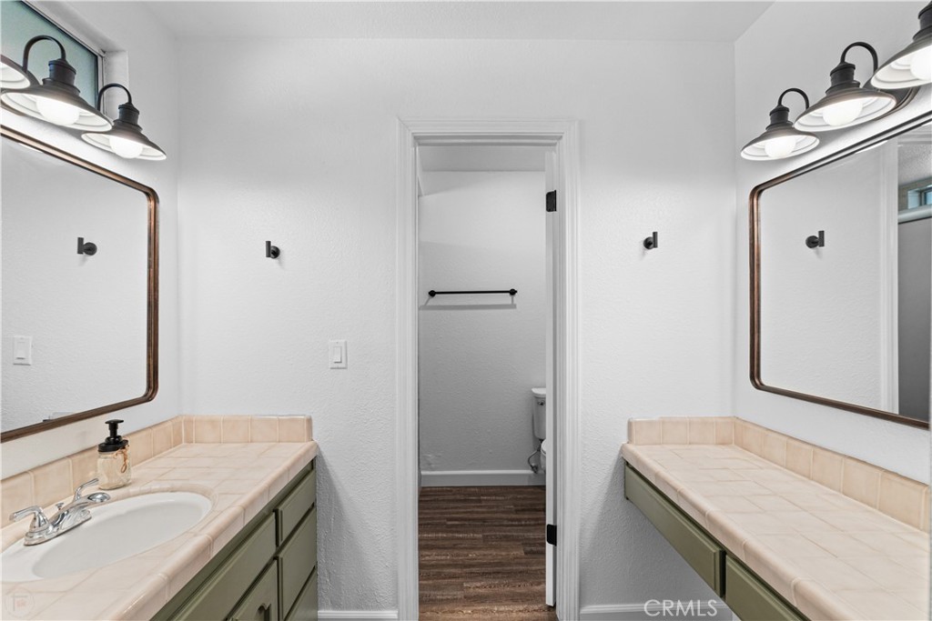 3585 Cabrillo Court Merced, CA 95348 - Photo 34 of 42 a bathroom with a sink and a mirror