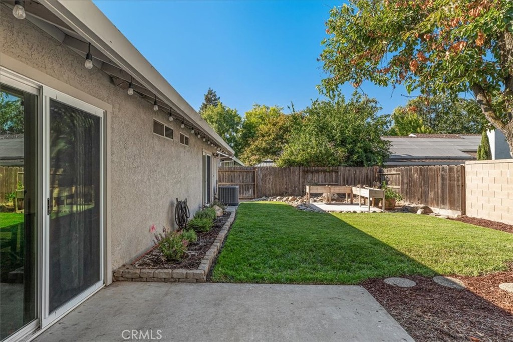 3585 Cabrillo Court Merced, CA 95348 - Photo 39 of 42 a view of backyard with seating area and green space