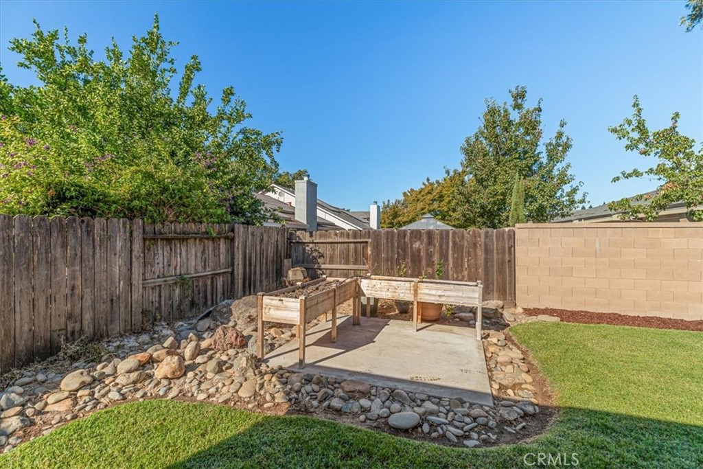 3585 Cabrillo Court Merced, CA 95348 - Photo 42 of 42 a view of a backyard with a garden