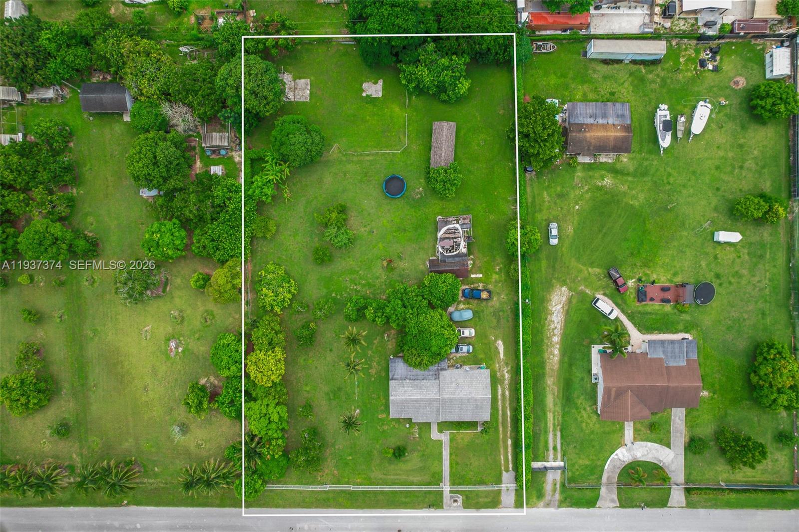 20890 Southwest 236th Street Homestead, FL 33031 - Photo 44 of 47 a view of a back yard