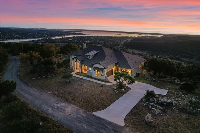 a view of a street with a ocean view