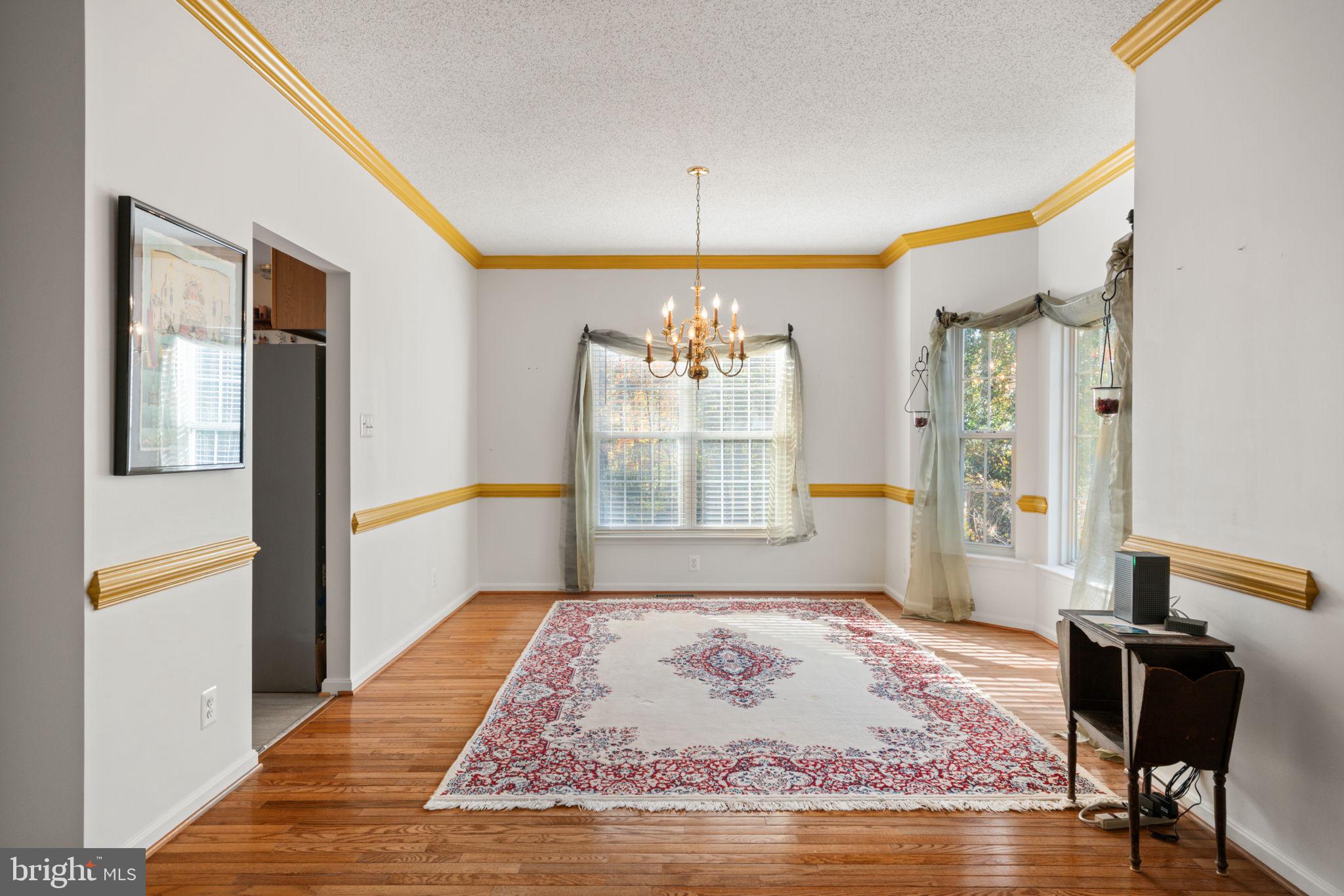 14760 Peach Tree Lane King George, VA 22485 - Photo 13 of 40 a living room with a rug