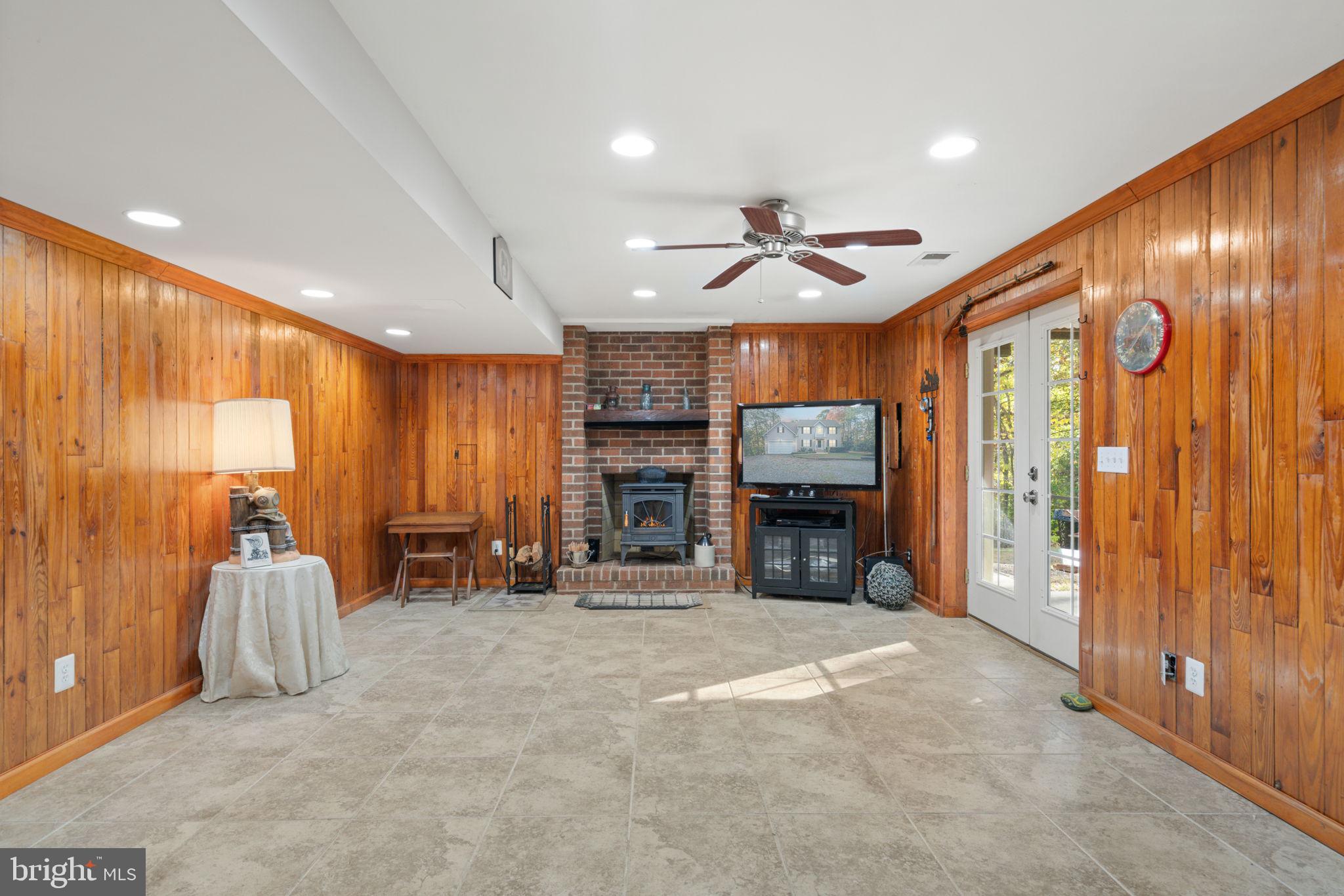 14760 Peach Tree Lane King George, VA 22485 - Photo 29 of 40 a view of a livingroom with furniture and a fireplace