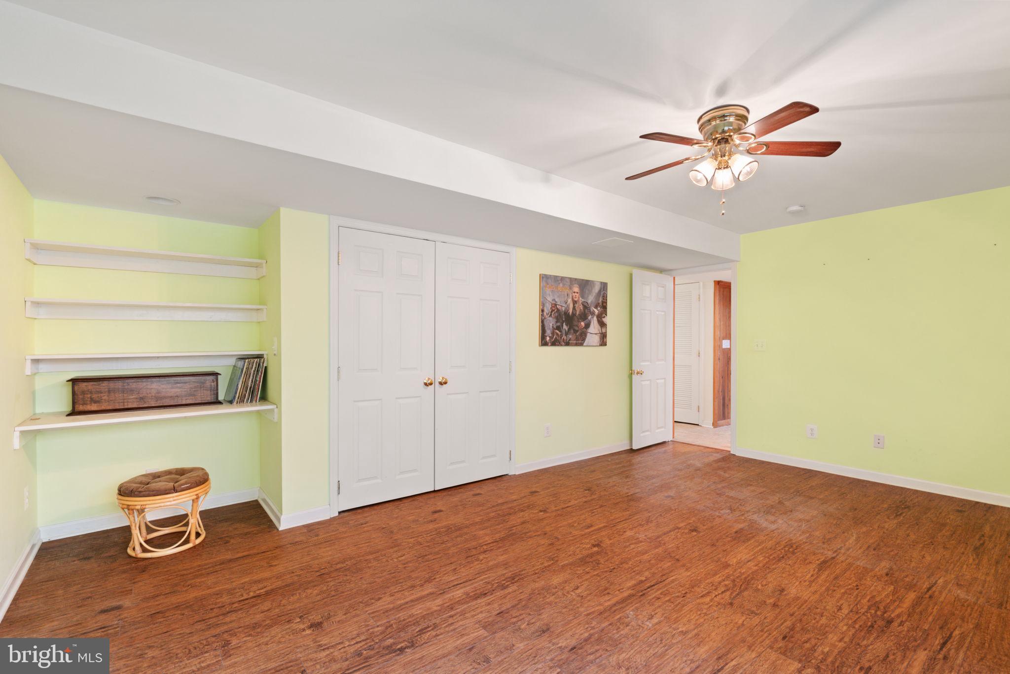 14760 Peach Tree Lane King George, VA 22485 - Photo 32 of 40 a view of room with window and wooden floor